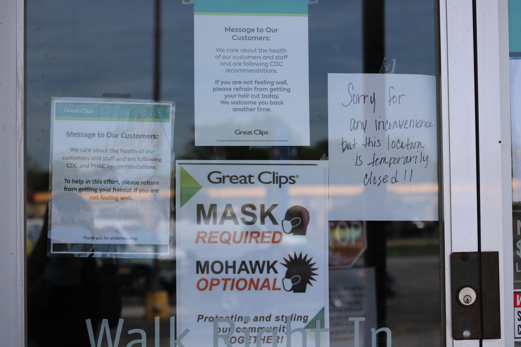 Sign on Great Clips door